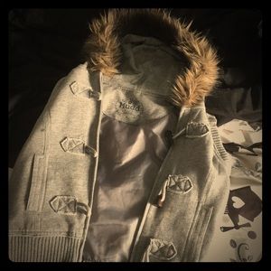 A mudd product husky sleeveless jacket